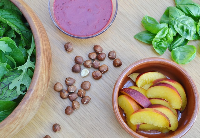 Salad Ingredients: Nectarine, Salad Leaves, Blackberry Dressing, Basil, Hazelnuts